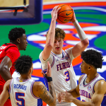 Florida center Micah Handlogten suffers severe ankle injury early in 2024 SEC Tournament final